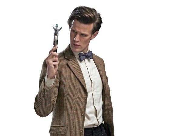 Actor Matt Smith in character as Doctor Who, looking towards his sonic screwdriver