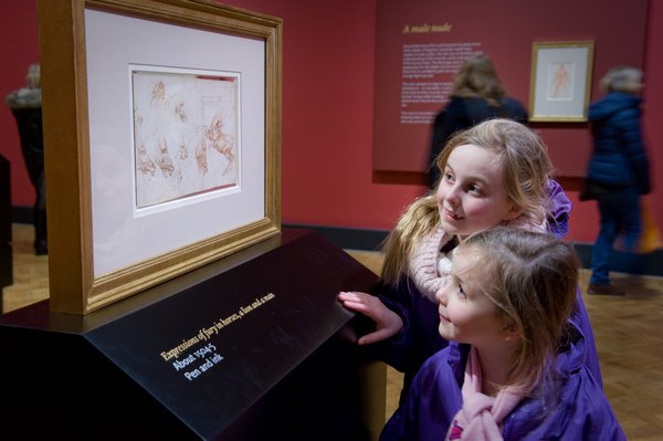 Two girls looks at an artwork by Leonardo da Vinci at the Laing Art Gallery 